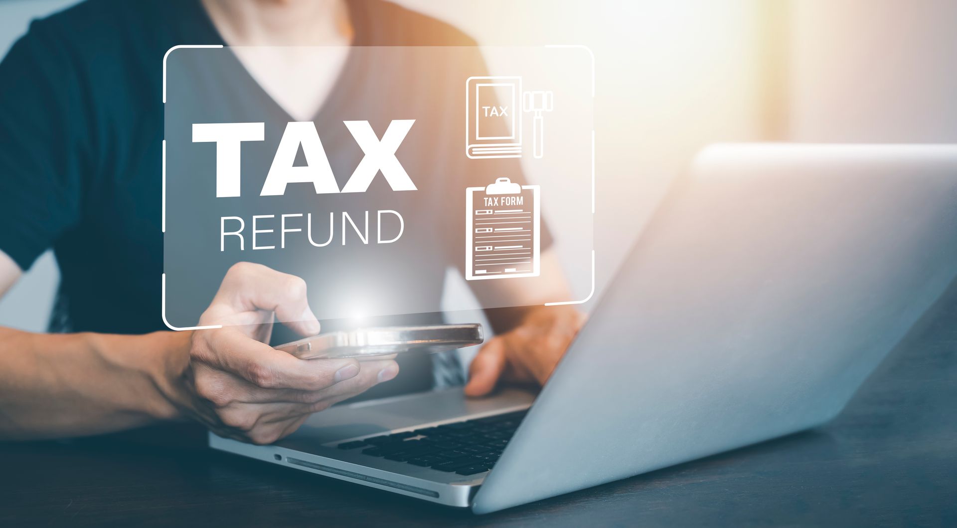 Hand Using Tablet With Bar Tax Refund And Refund Tax Of 21056320